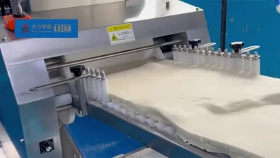 Ligne de production de petits pains fourrés
