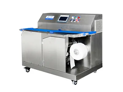 Machine automatique de pose de papier sulfurisé